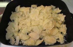 Potatoes and onions in skillet.