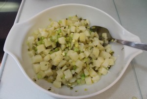 Mix potatoes with celery, pickle and onion.